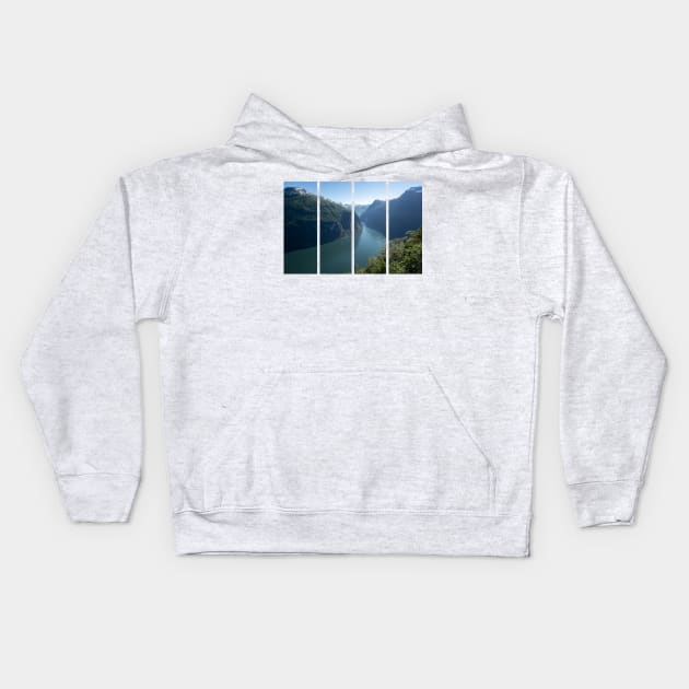 Wonderful landscapes in Norway. Vestland. Beautiful scenery of Geiranger Fjord from the Ornesvingen viewpoint. Snowed mountains, trees and waterfalls Kids Hoodie by fabbroni-art